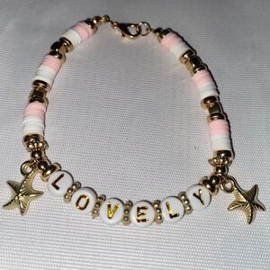 Lovely light pink, white, gold starfish bracelet